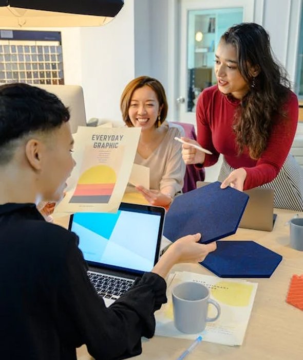 people discussing ideas in a web design agency